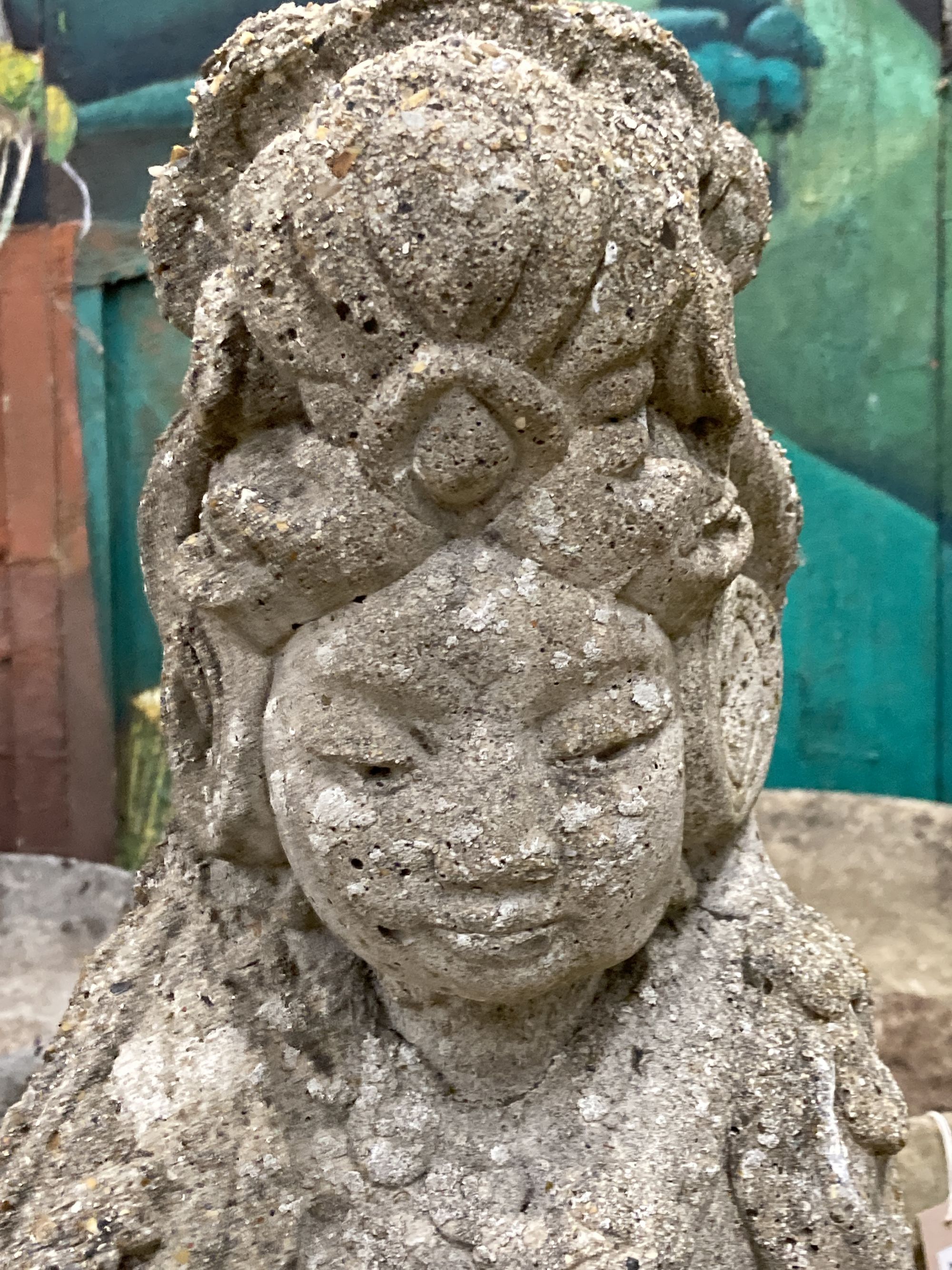 An Asian style reconstituted stone garden ornament, height 66cm